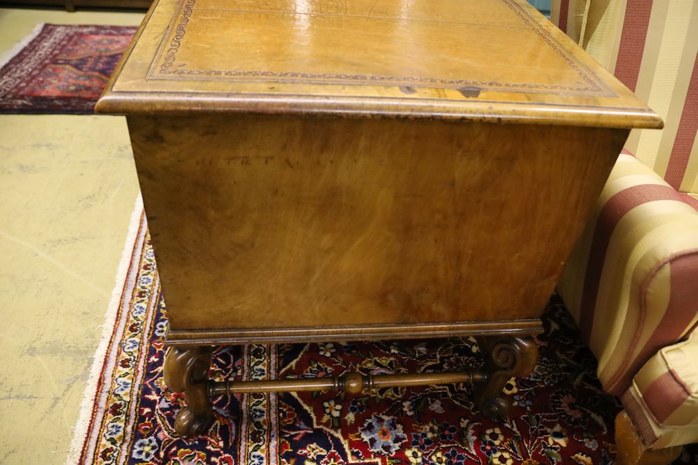 A Queen Anne style walnut kneehole desk, width 128cm, depth 70cm, height 76cm